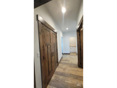This beautiful, spacious  new construction boasts vaulted on Council Mountain Golf Course in Idaho - for sale on GolfHomes.com, golf home, golf lot