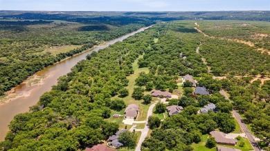 Live the life you've imagined. This spectacular home nestled in on Pecan Plantation Country Club in Texas - for sale on GolfHomes.com, golf home, golf lot