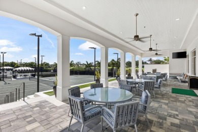 Experience unparalleled luxury in this modern masterpiece on Woodfield Country Club in Florida - for sale on GolfHomes.com, golf home, golf lot