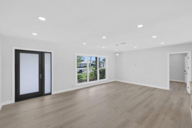 Welcome to this fully reimagined South Florida masterpiece! This on Lakeview Golf Club in Florida - for sale on GolfHomes.com, golf home, golf lot