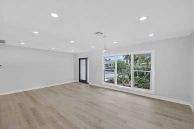 Welcome to this fully reimagined South Florida masterpiece! This on Lakeview Golf Club in Florida - for sale on GolfHomes.com, golf home, golf lot