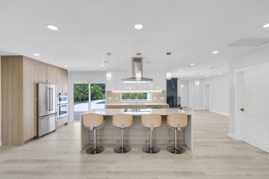 Welcome to this fully reimagined South Florida masterpiece! This on Lakeview Golf Club in Florida - for sale on GolfHomes.com, golf home, golf lot