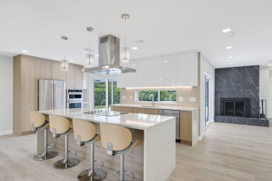 Welcome to this fully reimagined South Florida masterpiece! This on Lakeview Golf Club in Florida - for sale on GolfHomes.com, golf home, golf lot