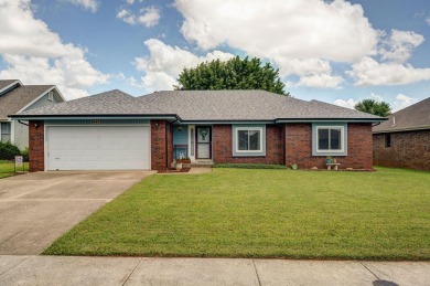 This one's been loved and it shows. Solid all brick home with on Horton Smith Golf Course in Missouri - for sale on GolfHomes.com, golf home, golf lot