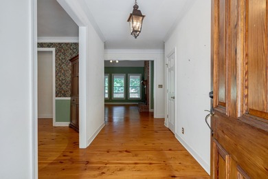 DISCOVER TIMELESS SOUTHERN ELEGANCE AND LUXURY LAKEFRONT LIVING on Great Waters Course At Reynolds Plantation in Georgia - for sale on GolfHomes.com, golf home, golf lot