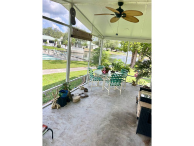 Welcome to this 2-bedroom, 2-bathroom home located in the gated on Pine Lakes Country Club in Florida - for sale on GolfHomes.com, golf home, golf lot