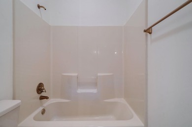 DISCOVER TIMELESS SOUTHERN ELEGANCE AND LUXURY LAKEFRONT LIVING on Great Waters Course At Reynolds Plantation in Georgia - for sale on GolfHomes.com, golf home, golf lot