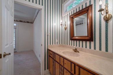 DISCOVER TIMELESS SOUTHERN ELEGANCE AND LUXURY LAKEFRONT LIVING on Great Waters Course At Reynolds Plantation in Georgia - for sale on GolfHomes.com, golf home, golf lot