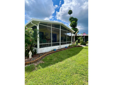 Welcome to this 2-bedroom, 2-bathroom home located in the gated on Pine Lakes Country Club in Florida - for sale on GolfHomes.com, golf home, golf lot