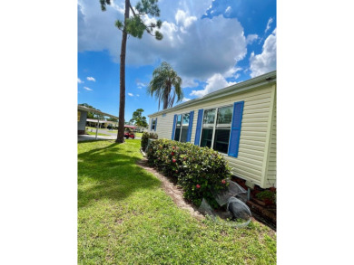 Welcome to this 2-bedroom, 2-bathroom home located in the gated on Pine Lakes Country Club in Florida - for sale on GolfHomes.com, golf home, golf lot