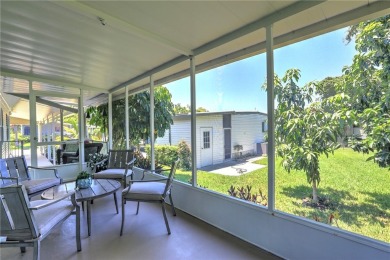 Beautifully maintained home built in 2002, offering over 1,500 on Barefoot Bay Golf Course in Florida - for sale on GolfHomes.com, golf home, golf lot