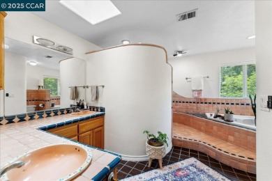 This charming 3-bedroom house on Hidden Valley Lake offers a on Hidden Valley Lake Golf and Country Club in California - for sale on GolfHomes.com, golf home, golf lot