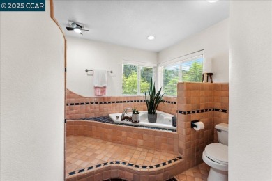 This charming 3-bedroom house on Hidden Valley Lake offers a on Hidden Valley Lake Golf and Country Club in California - for sale on GolfHomes.com, golf home, golf lot