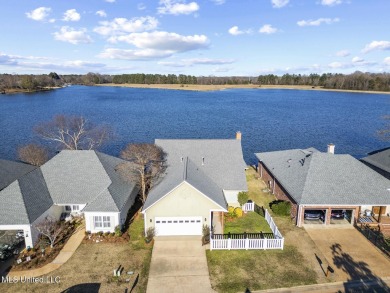 Stunning new waterfront listing in the highly desirable on Lake Caroline Golf Club in Mississippi - for sale on GolfHomes.com, golf home, golf lot