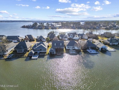 Stunning new waterfront listing in the highly desirable on Lake Caroline Golf Club in Mississippi - for sale on GolfHomes.com, golf home, golf lot