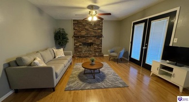 Welcome to this adorable brick home with full finished walkout on Doe Valley Country Club in Kentucky - for sale on GolfHomes.com, golf home, golf lot