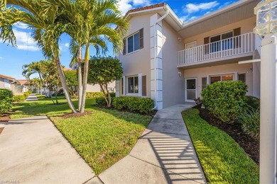 Light and bright first-floor END UNIT with serene lake views in on Glen Eagle Golf and Country Club in Florida - for sale on GolfHomes.com, golf home, golf lot
