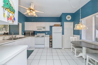 Light and bright first-floor END UNIT with serene lake views in on Glen Eagle Golf and Country Club in Florida - for sale on GolfHomes.com, golf home, golf lot