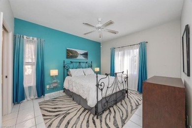 Light and bright first-floor END UNIT with serene lake views in on Glen Eagle Golf and Country Club in Florida - for sale on GolfHomes.com, golf home, golf lot