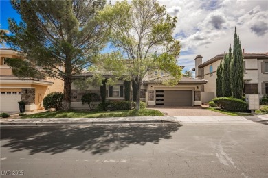 Nestled in a prestigious guard-gated community, this stunning on TPC Las Vegas in Nevada - for sale on GolfHomes.com, golf home, golf lot