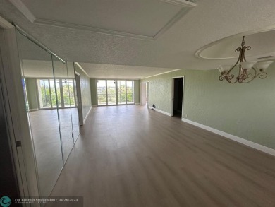 Enjoy breathtaking views of the golf course from your screened on Palm-Aire Country Club and Resort - The Oaks in Florida - for sale on GolfHomes.com, golf home, golf lot