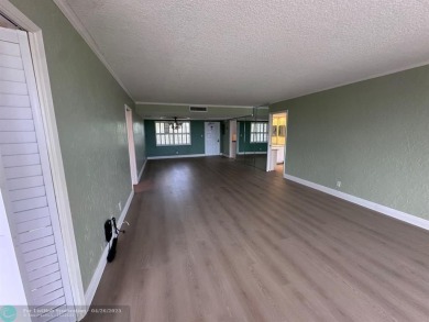Enjoy breathtaking views of the golf course from your screened on Palm-Aire Country Club and Resort - The Oaks in Florida - for sale on GolfHomes.com, golf home, golf lot