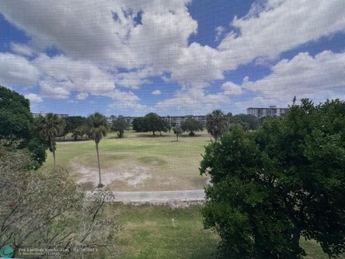 Enjoy breathtaking views of the golf course from your screened on Palm-Aire Country Club and Resort - The Oaks in Florida - for sale on GolfHomes.com, golf home, golf lot