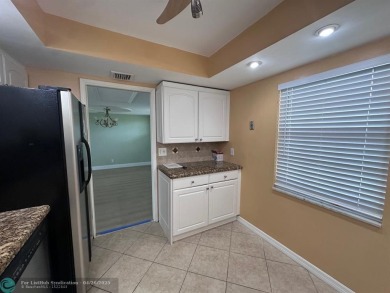 Enjoy breathtaking views of the golf course from your screened on Palm-Aire Country Club and Resort - The Oaks in Florida - for sale on GolfHomes.com, golf home, golf lot