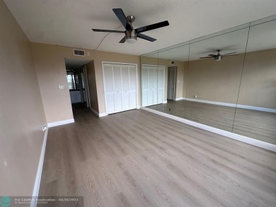 Enjoy breathtaking views of the golf course from your screened on Palm-Aire Country Club and Resort - The Oaks in Florida - for sale on GolfHomes.com, golf home, golf lot