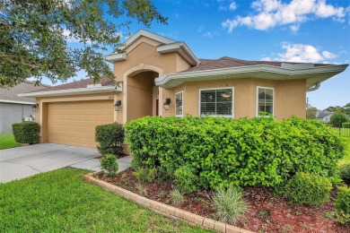 Welcome to this beautifully maintained 3-bedroom, 2-bathroom on Meadow Oaks Golf and Country Club in Florida - for sale on GolfHomes.com, golf home, golf lot