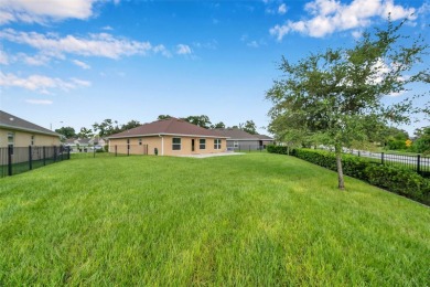 Welcome to this beautifully maintained 3-bedroom, 2-bathroom on Meadow Oaks Golf and Country Club in Florida - for sale on GolfHomes.com, golf home, golf lot