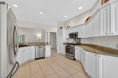 GORGEOUS, 3/2 BLOCK and STUCCO Gardenia featuring a FABULOUS on The Links of Spruce Creek in Florida - for sale on GolfHomes.com, golf home, golf lot