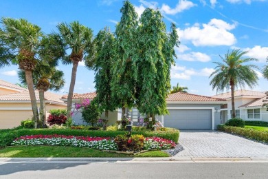 Experience luxury living in this beautifully renovated courtyard on Polo Club of Boca Raton in Florida - for sale on GolfHomes.com, golf home, golf lot