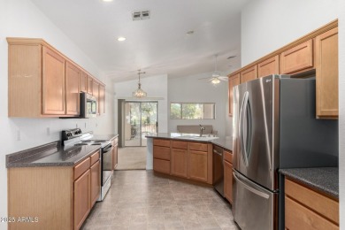 This lovely home is nestled on the 16th fairway of the on Raven Golf Club At South Mountain in Arizona - for sale on GolfHomes.com, golf home, golf lot