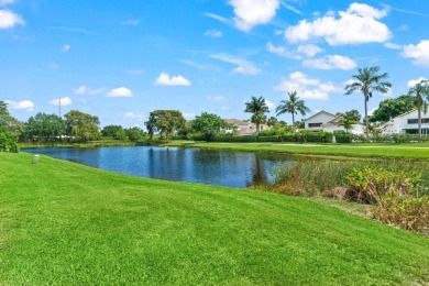 Experience luxury living in this beautifully renovated courtyard on Polo Club of Boca Raton in Florida - for sale on GolfHomes.com, golf home, golf lot