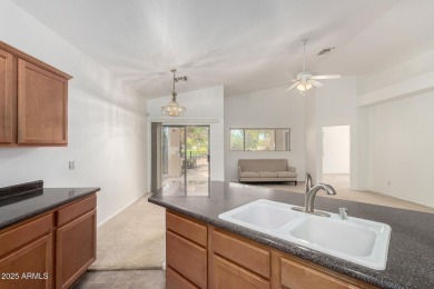 This lovely home is nestled on the 16th fairway of the on Raven Golf Club At South Mountain in Arizona - for sale on GolfHomes.com, golf home, golf lot