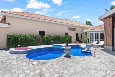 Experience luxury living in this beautifully renovated courtyard on Polo Club of Boca Raton in Florida - for sale on GolfHomes.com, golf home, golf lot