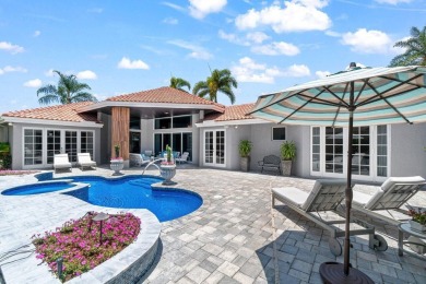 Experience luxury living in this beautifully renovated courtyard on Polo Club of Boca Raton in Florida - for sale on GolfHomes.com, golf home, golf lot