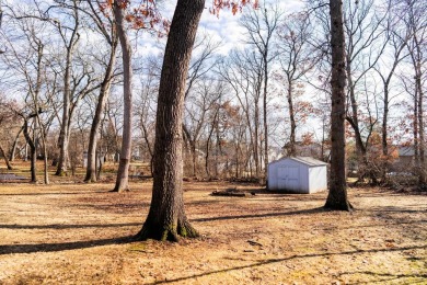 This charming 1.5 story home, nestled near the golf course on Savannah Oaks Golf Club of Candlewick Lake in Illinois - for sale on GolfHomes.com, golf home, golf lot