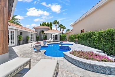 Experience luxury living in this beautifully renovated courtyard on Polo Club of Boca Raton in Florida - for sale on GolfHomes.com, golf home, golf lot