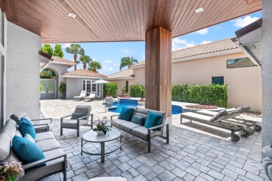 Experience luxury living in this beautifully renovated courtyard on Polo Club of Boca Raton in Florida - for sale on GolfHomes.com, golf home, golf lot