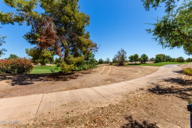This lovely home is nestled on the 16th fairway of the on Raven Golf Club At South Mountain in Arizona - for sale on GolfHomes.com, golf home, golf lot