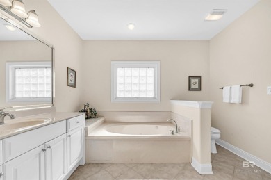 This golf course home is on the signature hole of the Dunes on Glenlakes Golf Club in Alabama - for sale on GolfHomes.com, golf home, golf lot