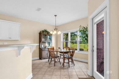 This golf course home is on the signature hole of the Dunes on Glenlakes Golf Club in Alabama - for sale on GolfHomes.com, golf home, golf lot