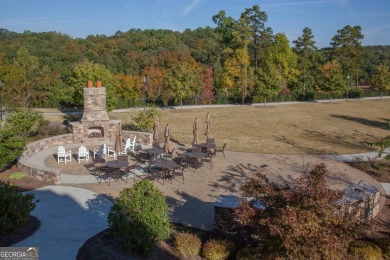 Nestled at the end of a serene cul-de-sac, this charming house on Lanier Island Legacy Golf Couorse in Georgia - for sale on GolfHomes.com, golf home, golf lot