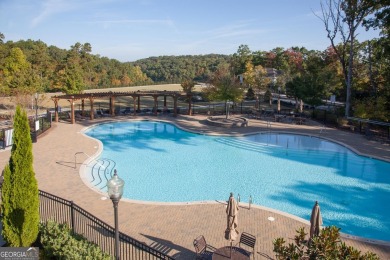 Nestled at the end of a serene cul-de-sac, this charming house on Lanier Island Legacy Golf Couorse in Georgia - for sale on GolfHomes.com, golf home, golf lot