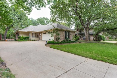 STUNNING UPDATED ONE STORY 4 BEDROOM,2.1 BATH HOME nestled in an on Texas Rangers Golf Club  in Texas - for sale on GolfHomes.com, golf home, golf lot