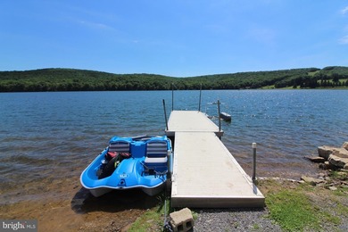 Experience ALPINE LAKE RESORT LIVING at its finest on this on Alpine Lake Resort in West Virginia - for sale on GolfHomes.com, golf home, golf lot