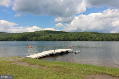 Experience ALPINE LAKE RESORT LIVING at its finest on this on Alpine Lake Resort in West Virginia - for sale on GolfHomes.com, golf home, golf lot