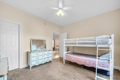 This golf course home is on the signature hole of the Dunes on Glenlakes Golf Club in Alabama - for sale on GolfHomes.com, golf home, golf lot